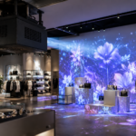 Fan-cooled projector enclosure used for retail projection mapping with the projected display as the main focus.