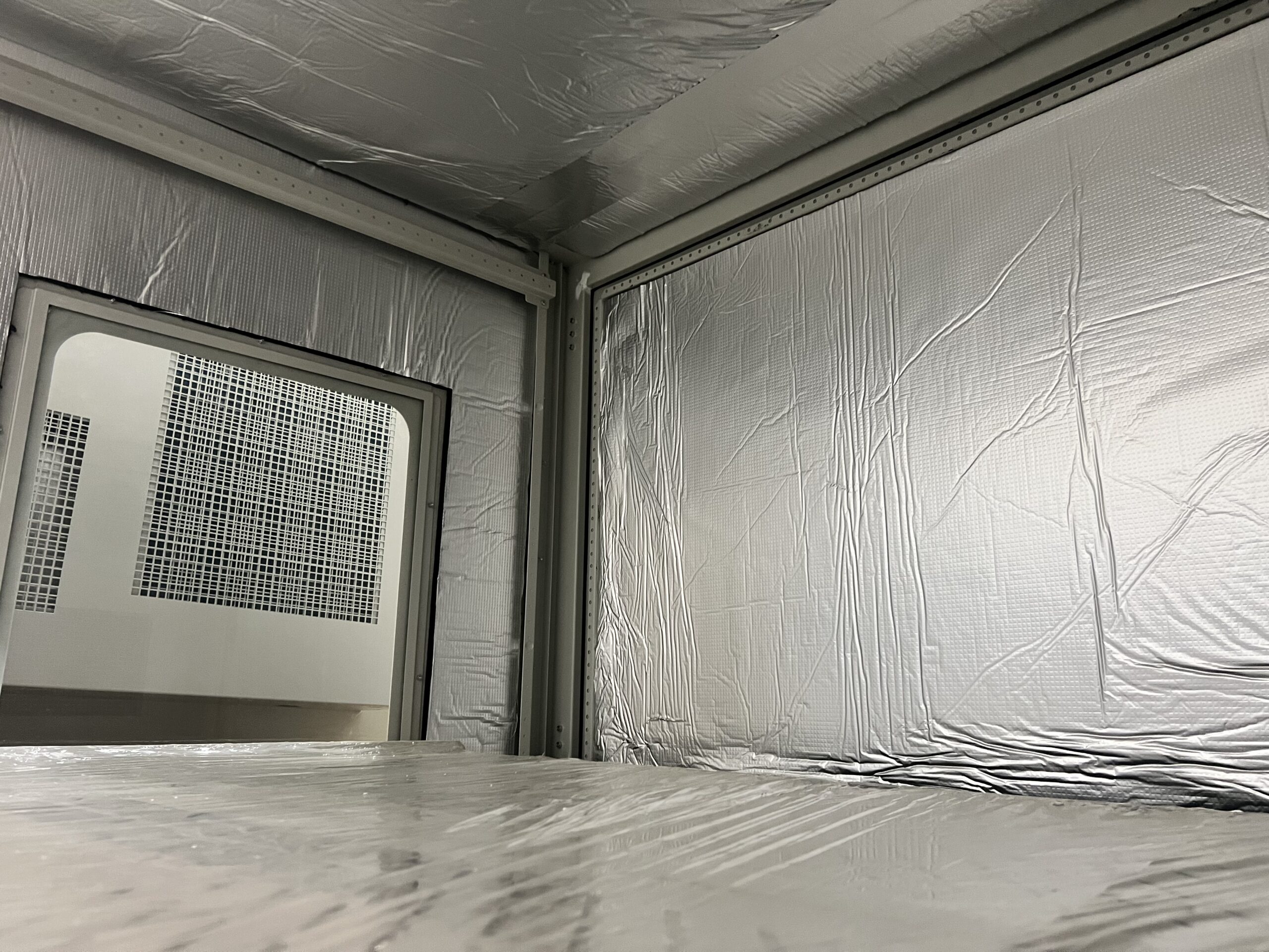Insulated Defender projector enclosure interior